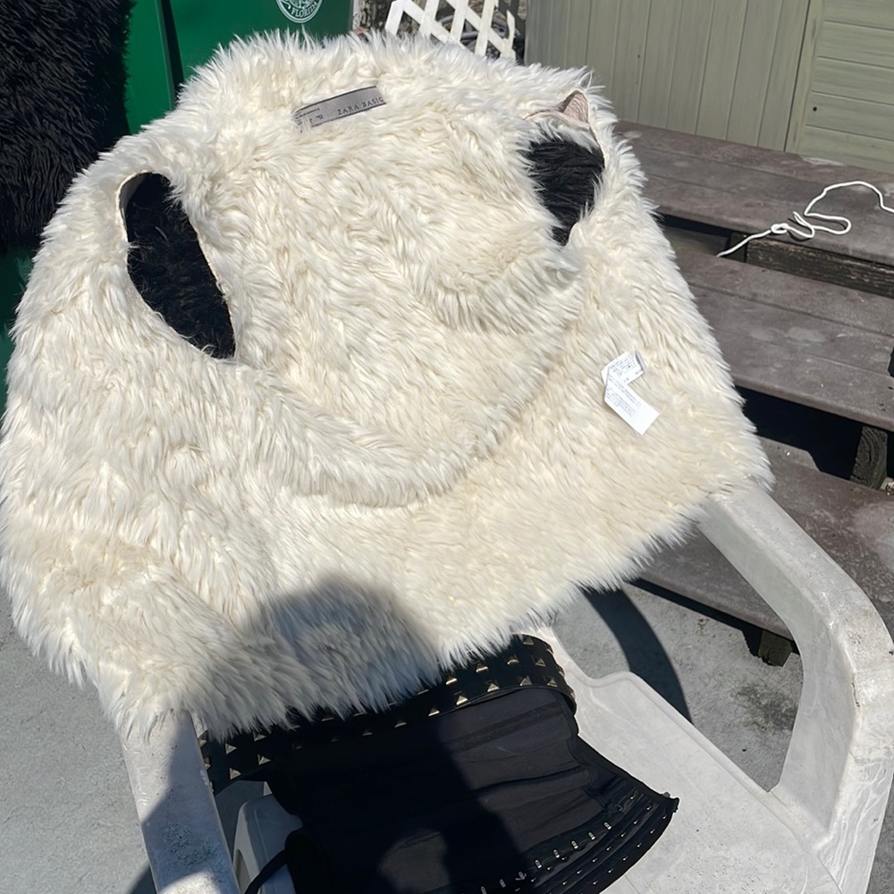 Fluffy white party vest